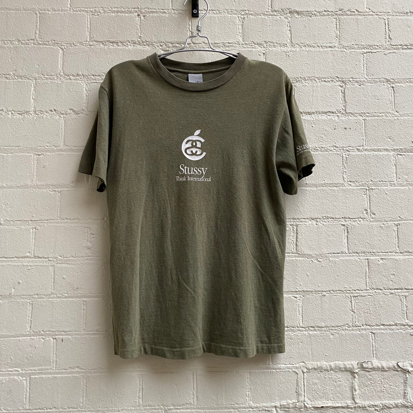 Stussy 1990s “Think International” Apple T-Shirt