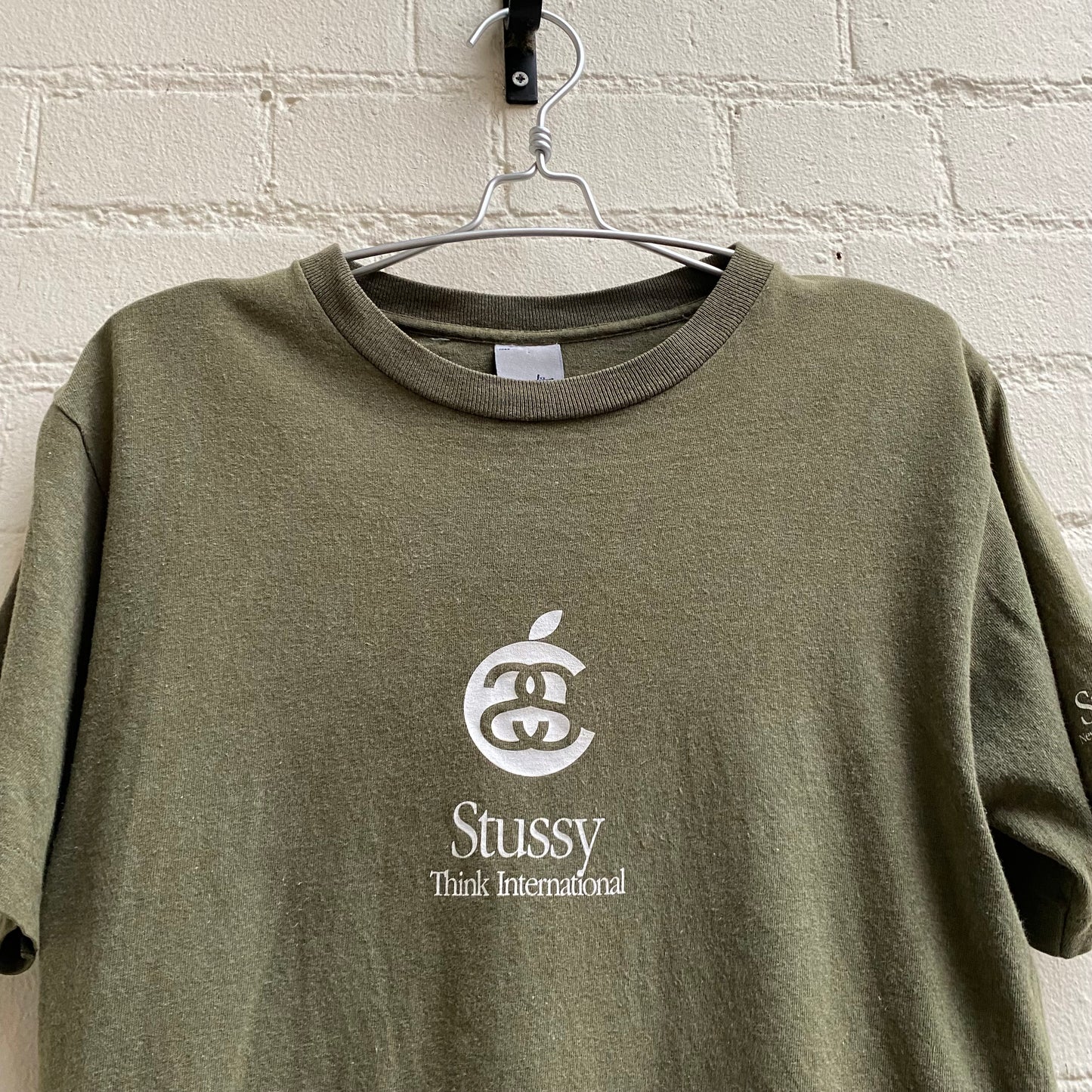 Stussy 1990s “Think International” Apple T-Shirt