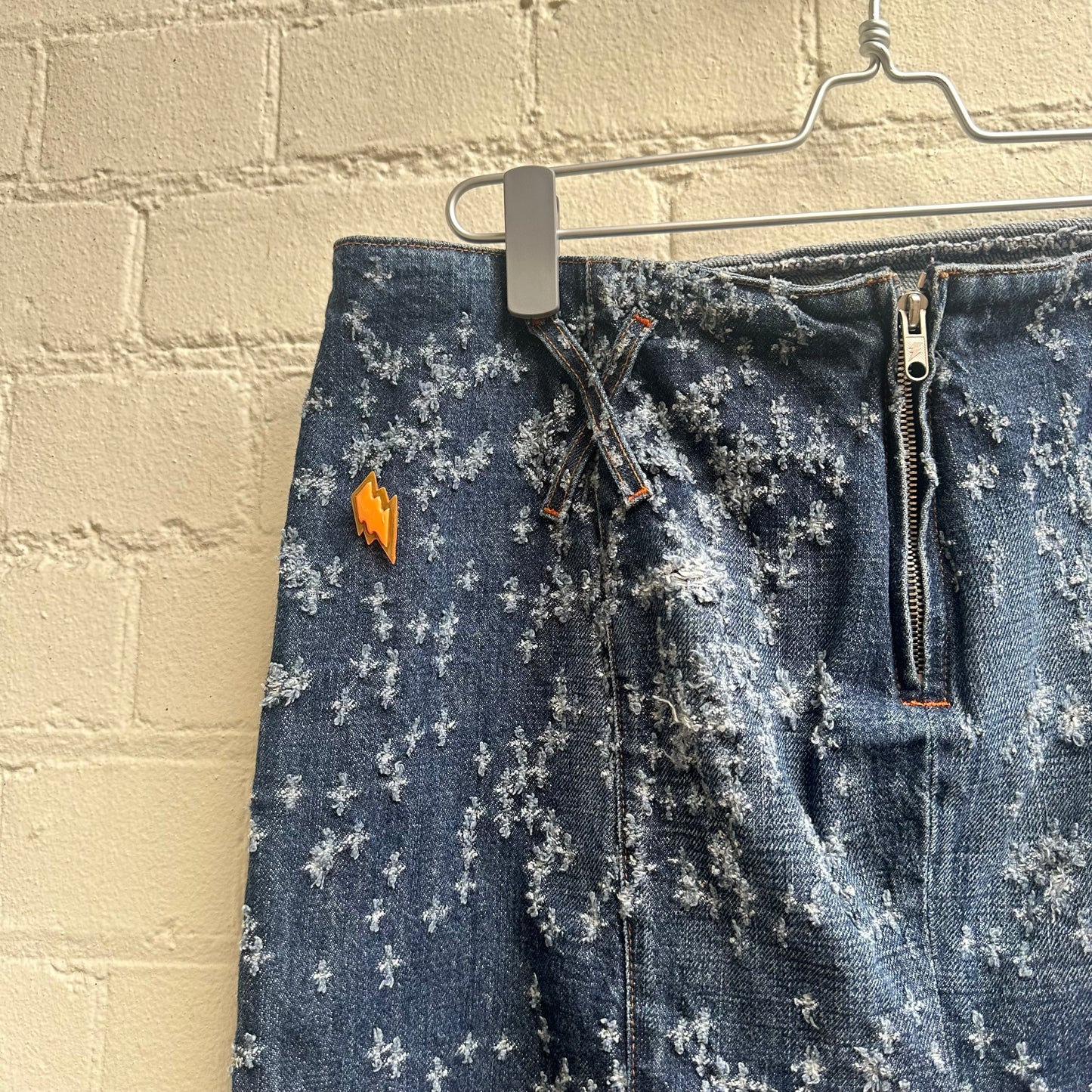W&LT by Walter Van Beirendonck Gunshot Distressed Denim Skirt